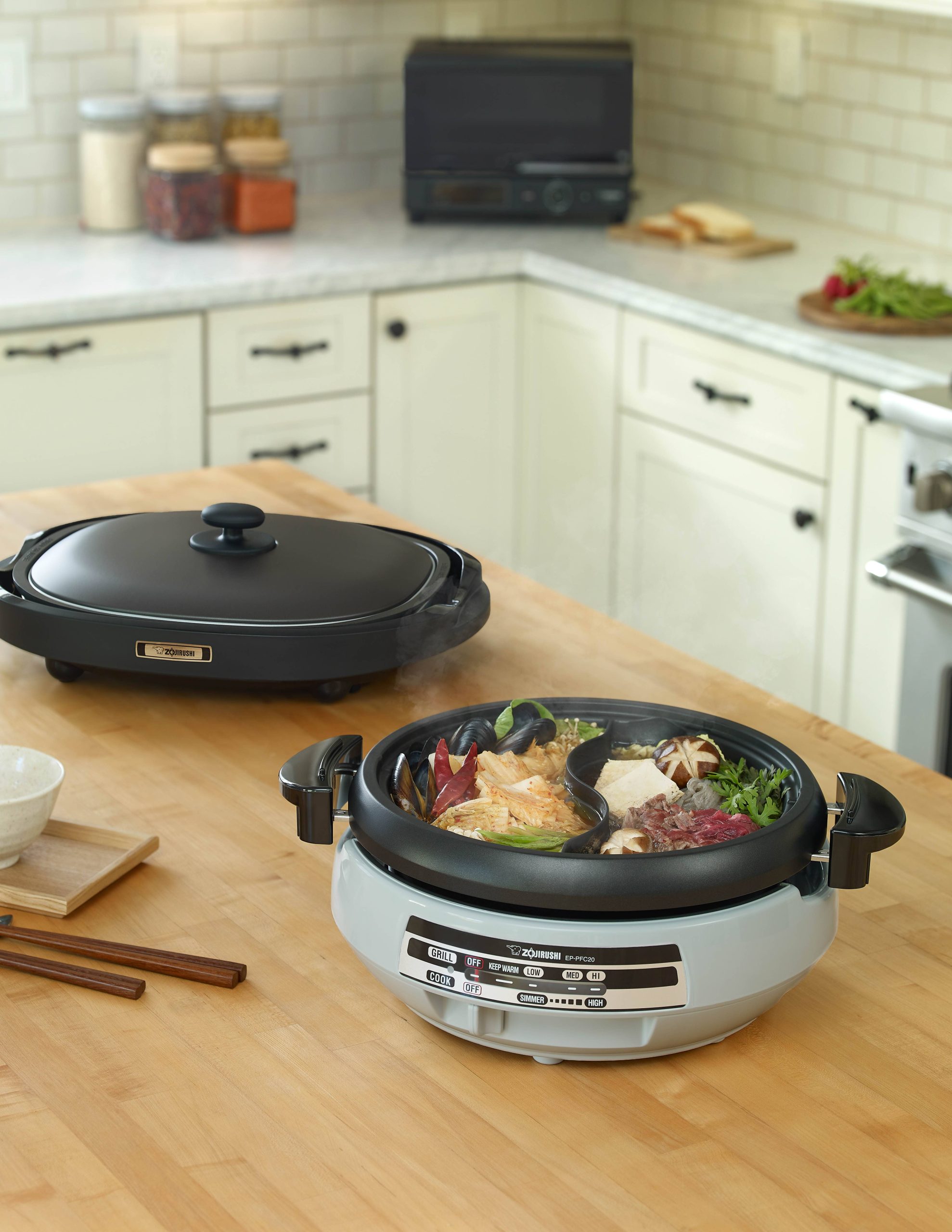 Warm Up This Winter by Cooking in These Electric Hot Pots
