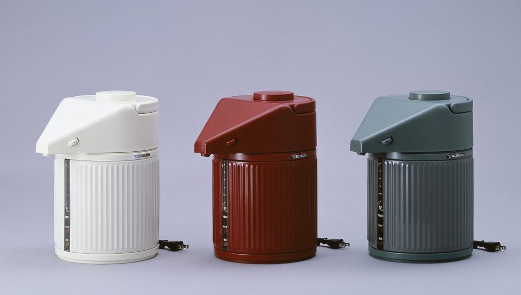 White air pot, red air pot, and green air pot in a grey background