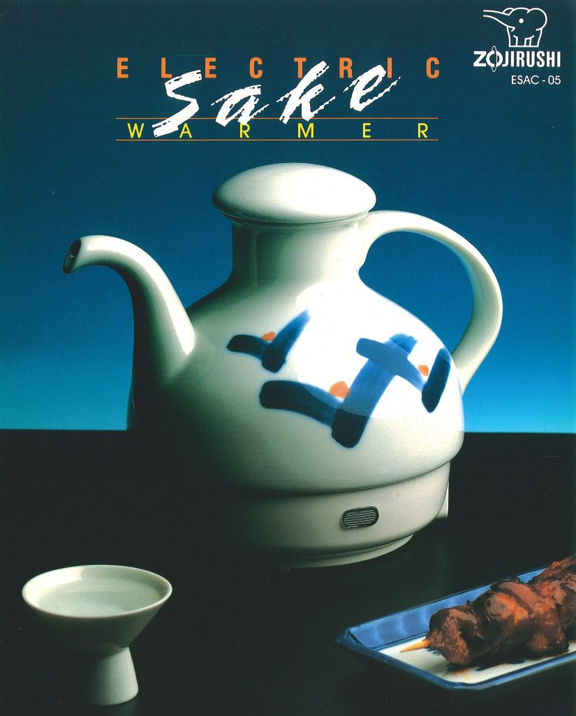 White pot Sake warmer, small cup, and small dish in a dark blue background