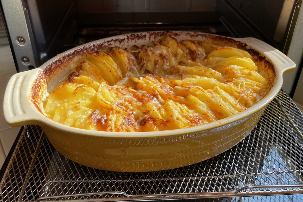 scalloped potatoes coming out of toaster oven