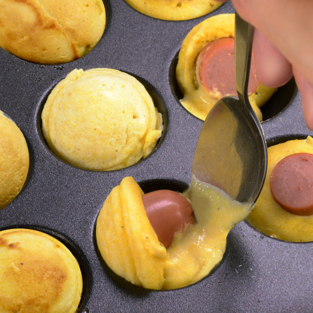 Flipping half cooked corndog