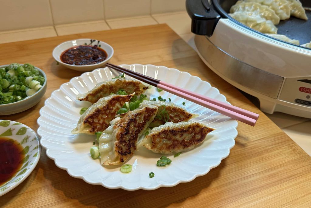 plated gyoza on white plate